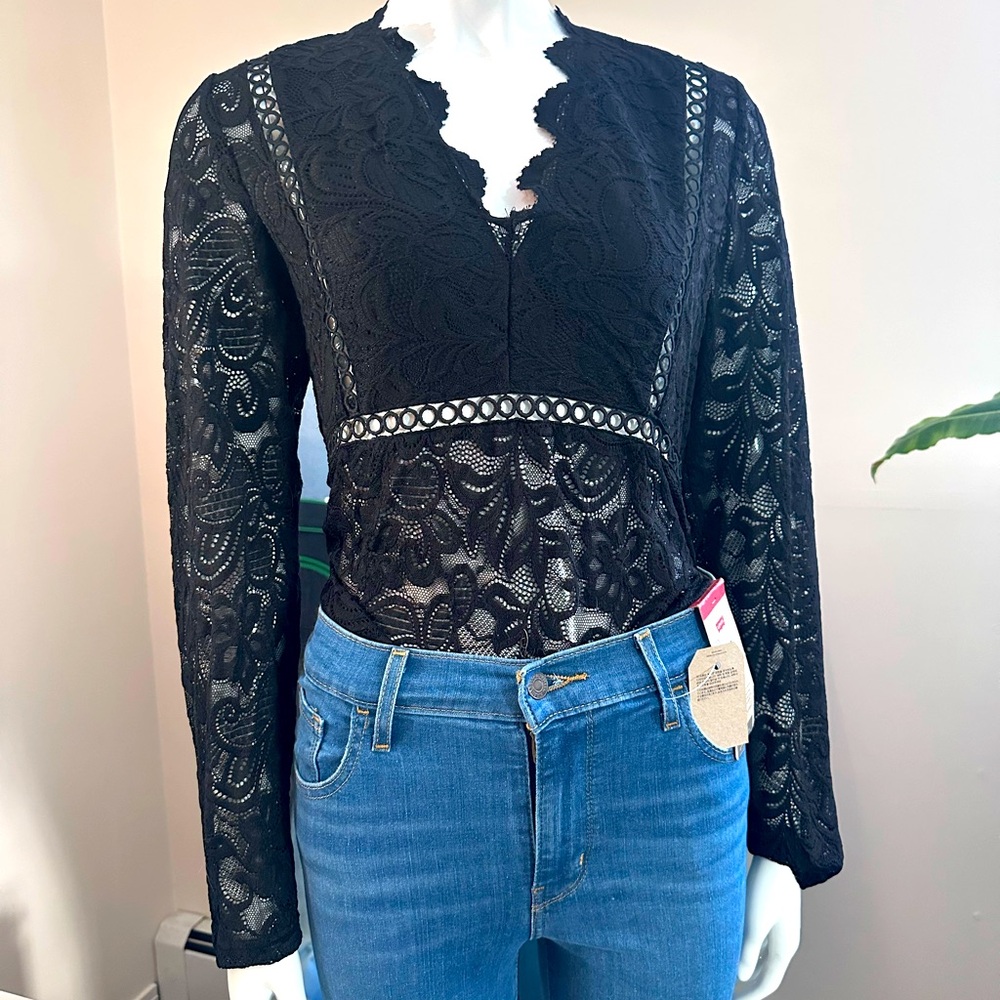 Woman’s Lace Bodysuit Size Large